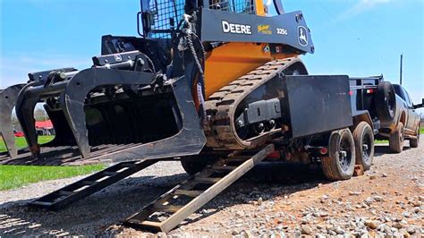 how to load skid steer into a box truck|how to load a skid steer.